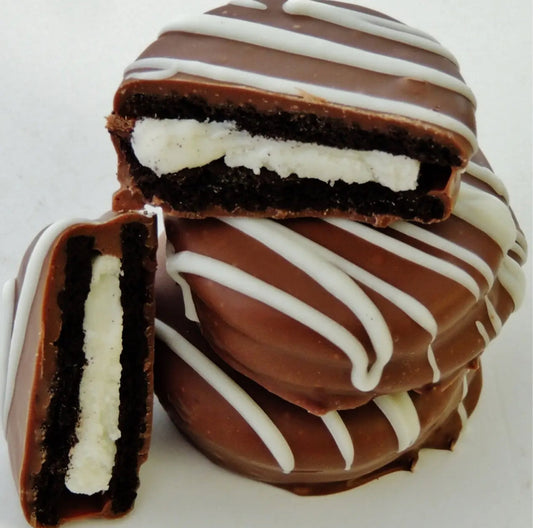 Chocolate Dipped Vanilla Cream Cookies by Chocolate Pizza Company Inc