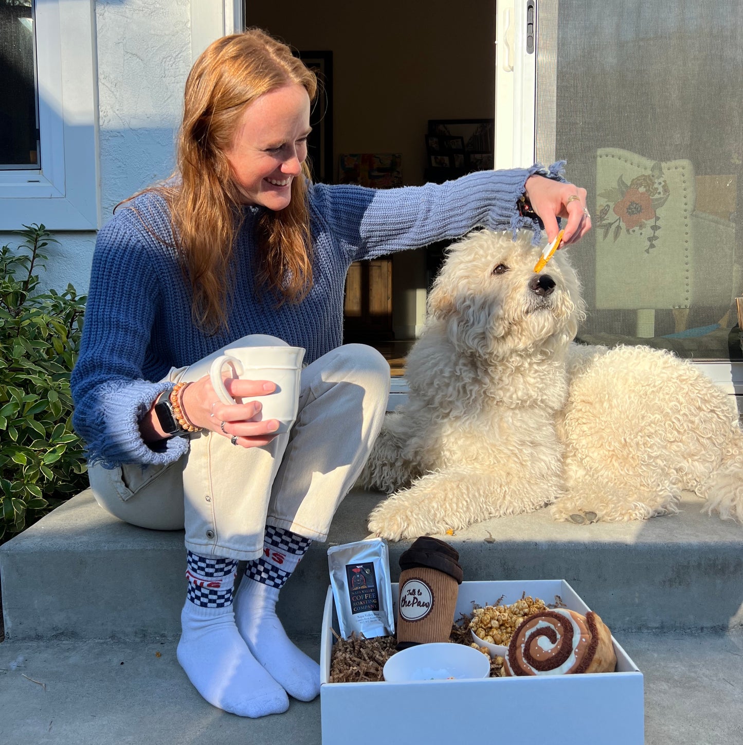 sammy and lucca enjoying the coffee and pawfee buddies by lucca gift box